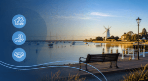 Equity Release Adviser in Tollesbury with a peaceful coastal harbour scene and equity release icons.