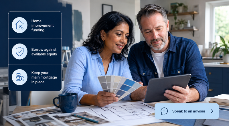 Second charge mortgage for home improvements with a middle-aged mixed couple reviewing renovation plans and paint samples.