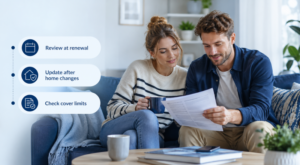 Young couple reviewing home insurance documents at home, with icons highlighting renewal reviews, home changes and cover limits.